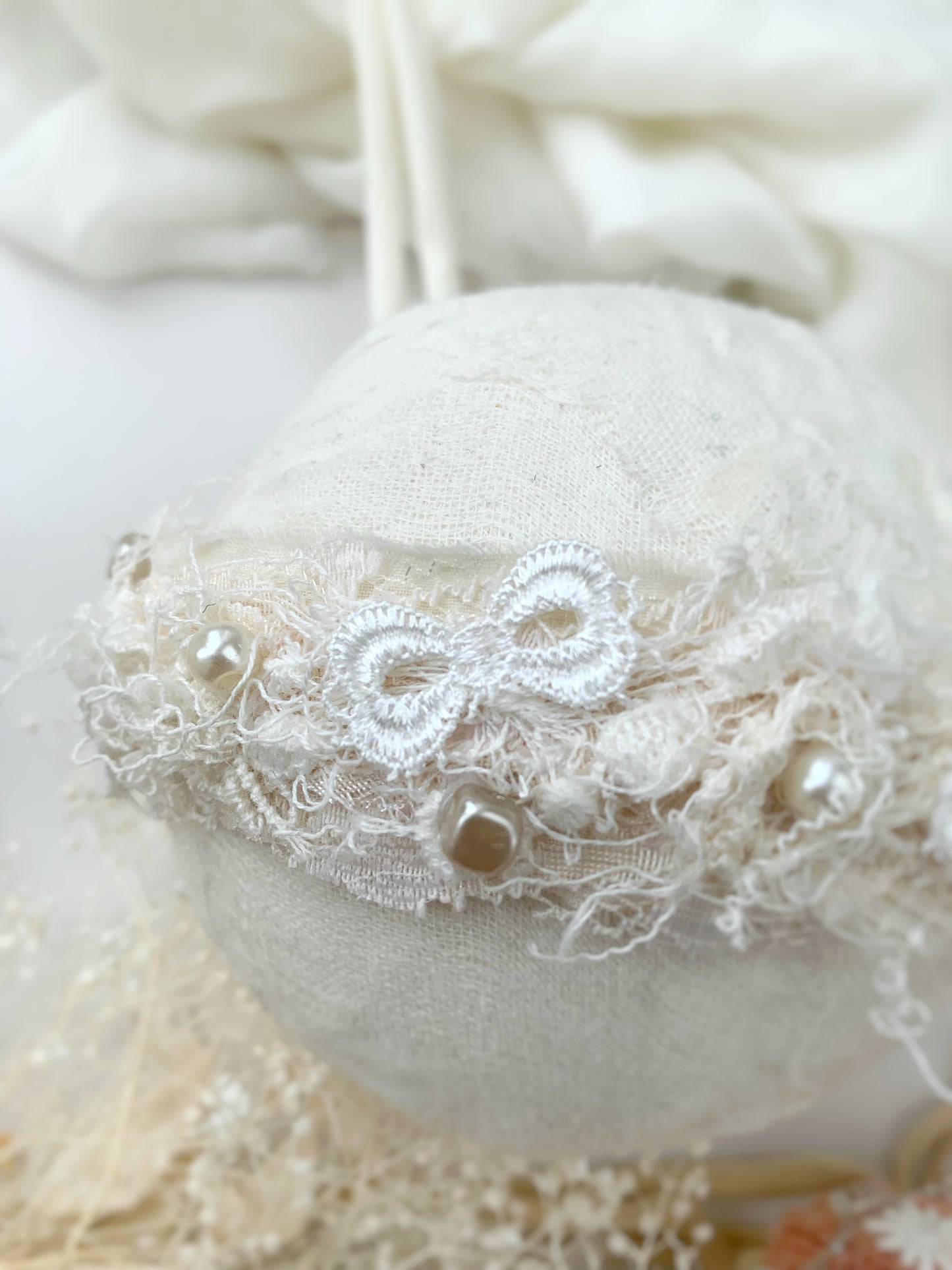 details of the baby ivory cream headband little bow and beads