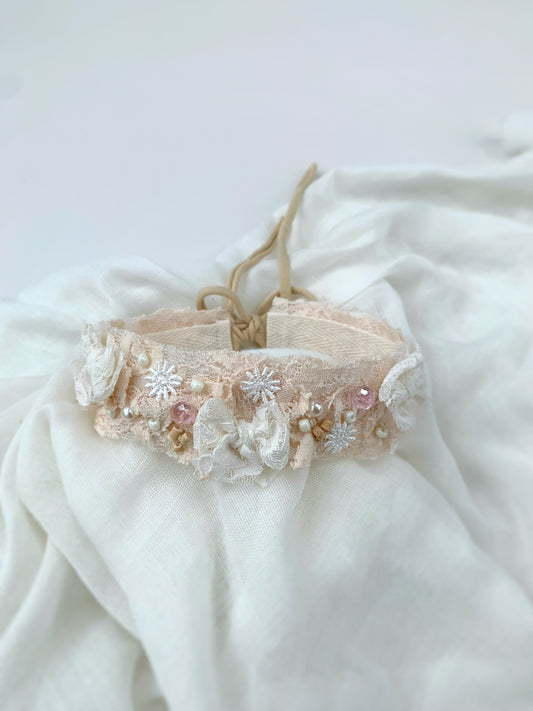delicate floral embroidered baby bow headband in white and blush pink