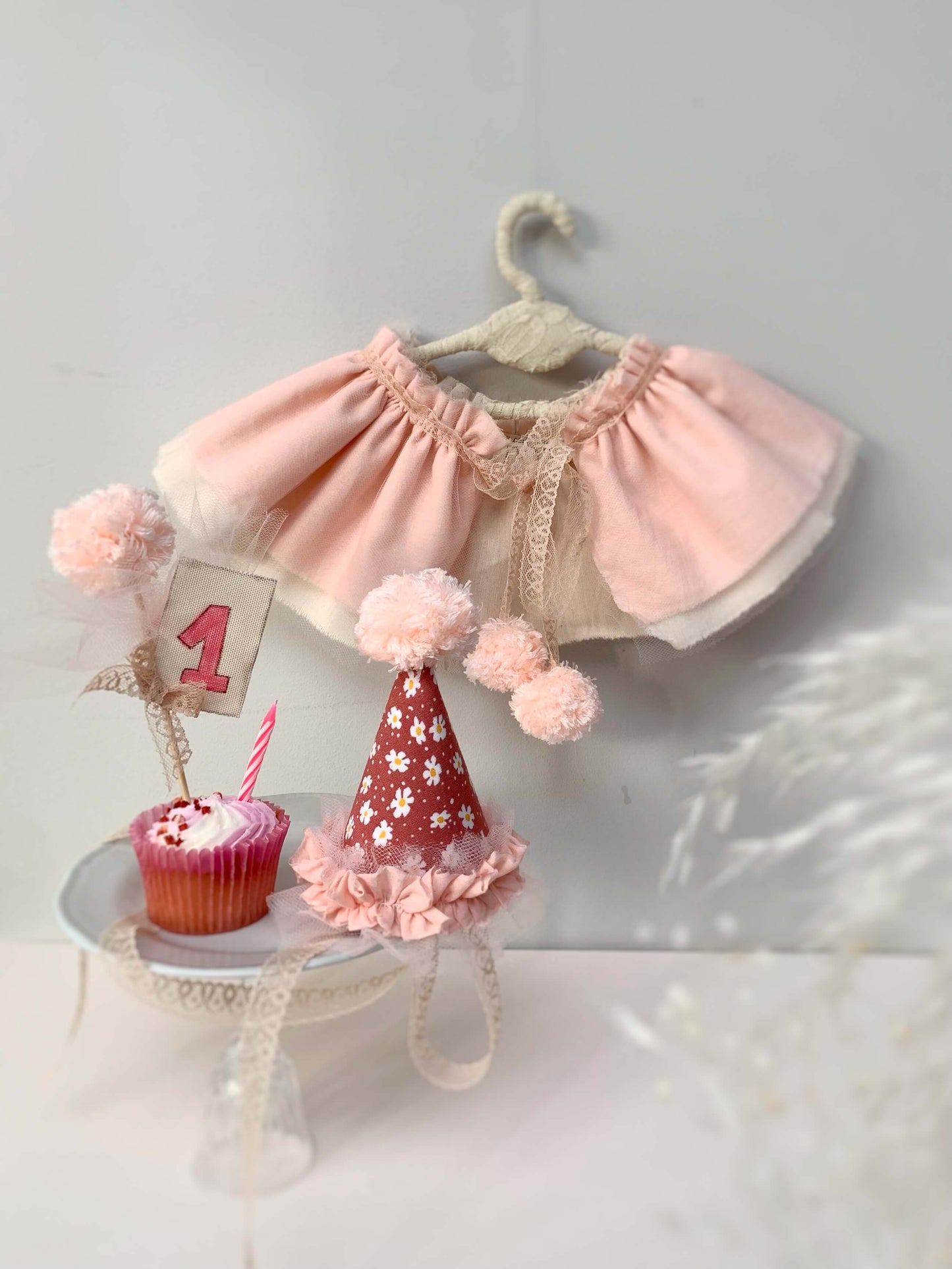 ink and coral peach first birthday hat for baby girl