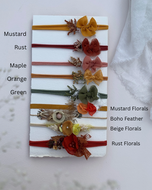 Handmade baby headband decorated with preserved flowers