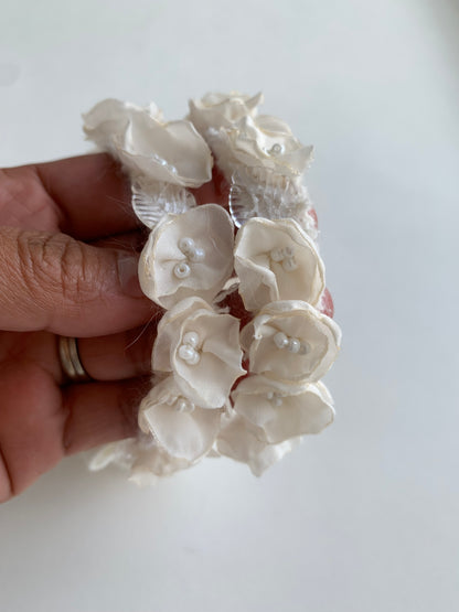 details close up ivory baby floral details  showing little pearls middle headband