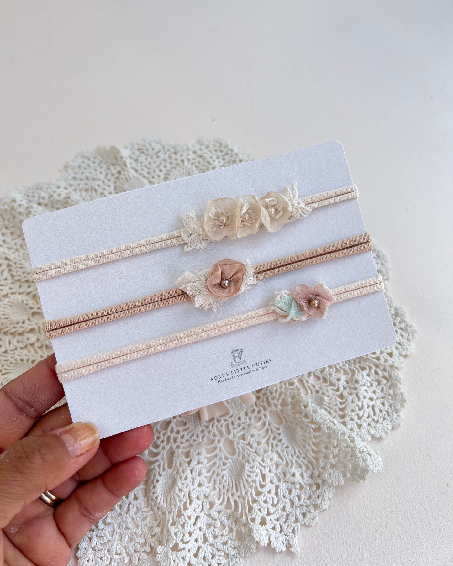 Neutral newborn tieback headband photography prop for newborn photoshoots