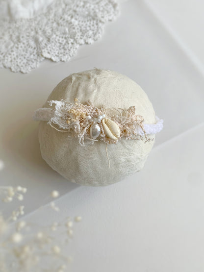 showing the detail of one of the headbands on a ball to show size
