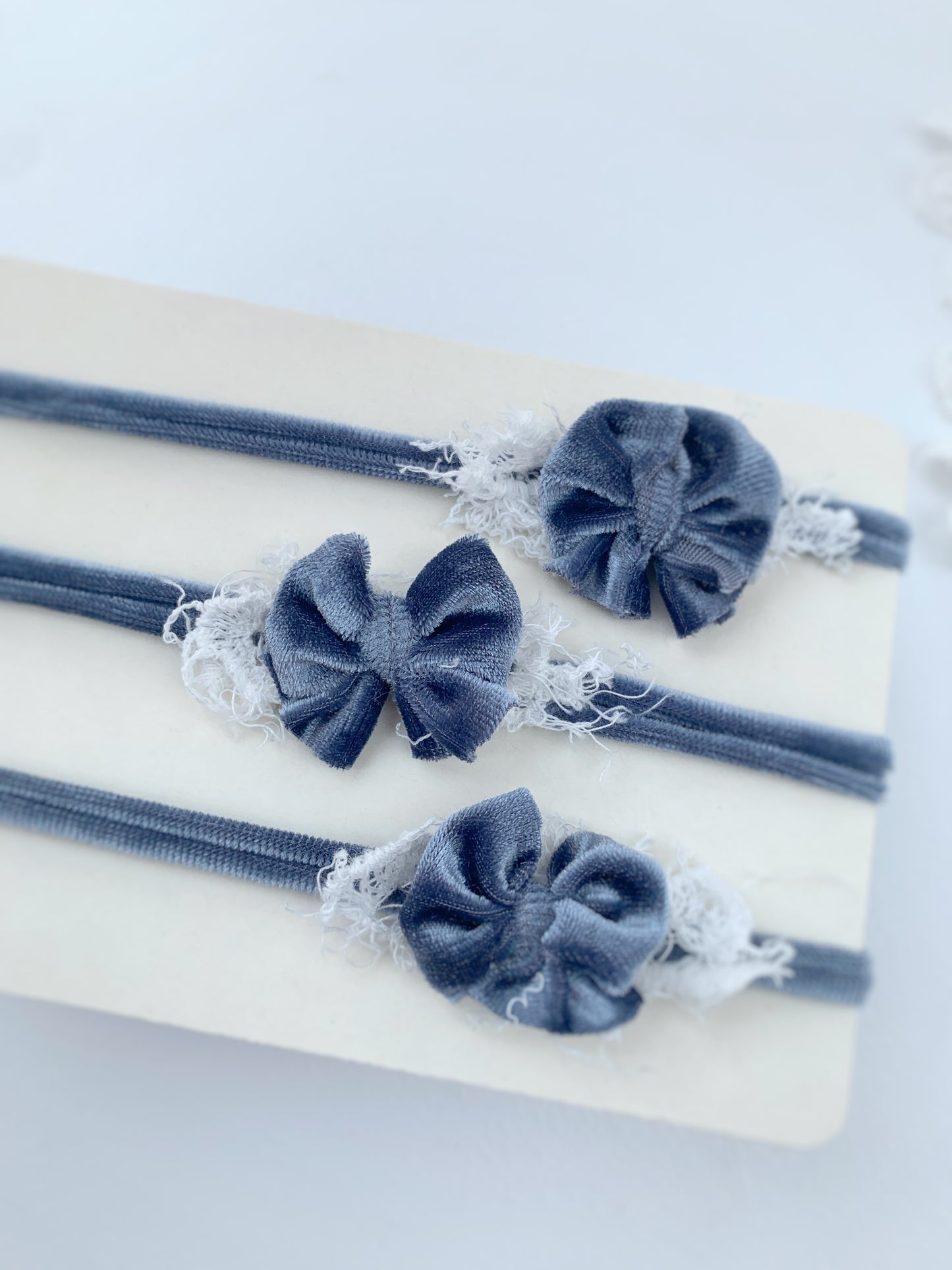 details os the dainty baby bows on the headband