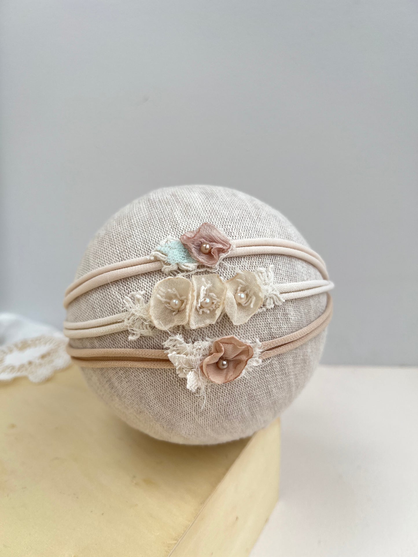 Neutral newborn tieback headband photography prop for newborn photoshoots