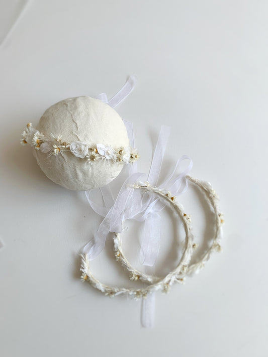 Top view of soft ivory headband with chiffon flower details
